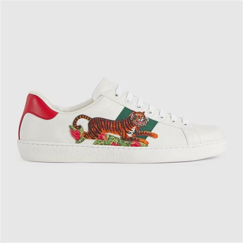 Gucci tiger sneakers